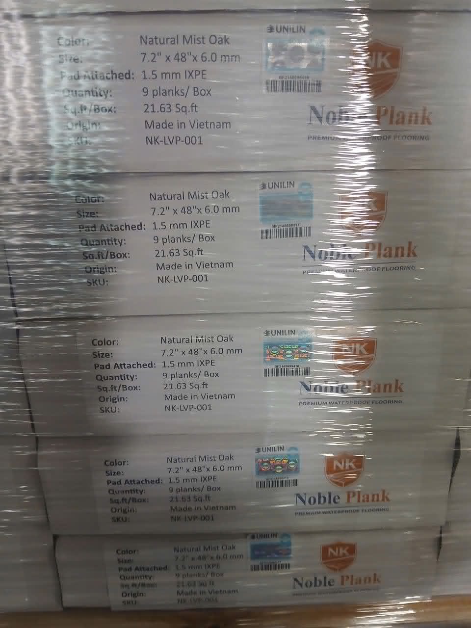 Pallets labeled by SKU in warehouse